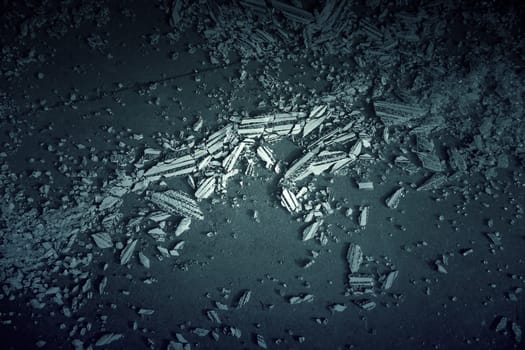 Detail of broken glass in the garbage, danger due to cuts