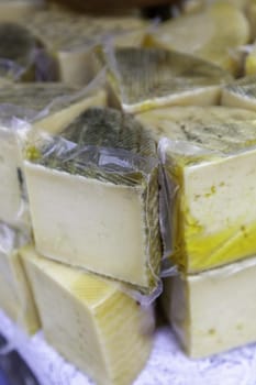 Detail of artisanal dairy product in an old market in Europe