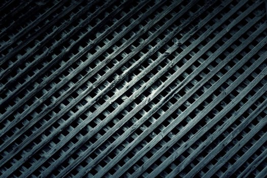 Detail of wooden grille for protection and decoration in a window