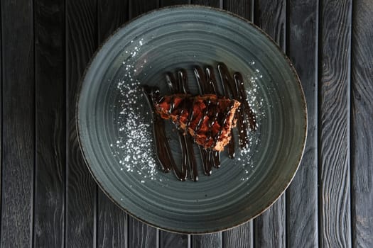 Piece of puffy chocolate cake and souffle. Top view.