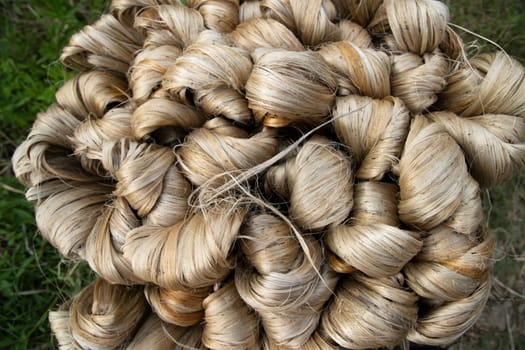 thick brown bundle of raw jute fiber Texture Background.  Golden Fiber Texture background