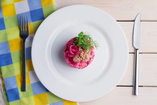 Top view of salad with tuna, beetroot and carrot