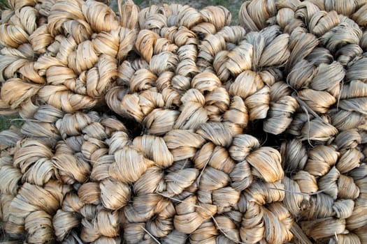 thick brown bundle of raw jute fiber Texture Background.  Golden Fiber Texture background