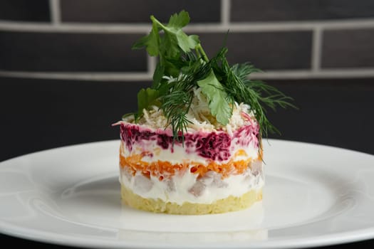 salad herring with beetroot, potato and mayonnaise