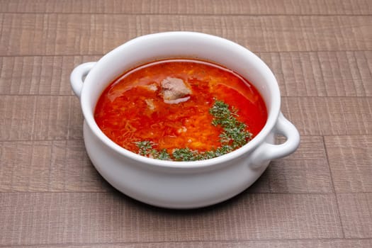 Portion of kharcho soup in deep plate