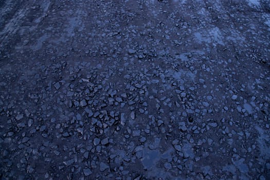 Black Raw  bitumen mosaic road stone  Texture background