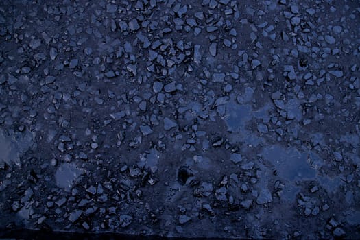 Black Raw  bitumen mosaic road stone  Texture background