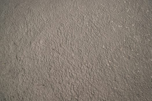 sand texture. wet sand textured background. sand textured beach