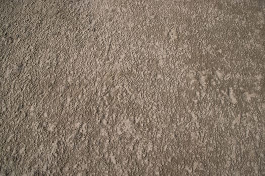 sand texture. wet sand textured background. sand textured beach