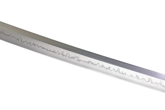 Japanese sword blade on white background. Soft focus. The wavy pattern on the blade edge is a line of hardness that a blacksmith makes so that the blade doesn't break. Choji Hamon style.