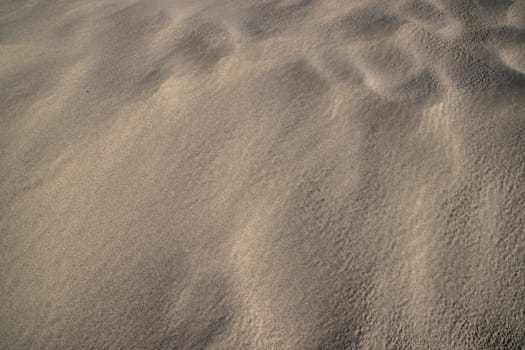 sand texture. wavy sand textured background. sand textured beach
