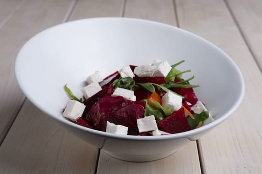 Salad with beetroot, radish, pepper and feta cheese