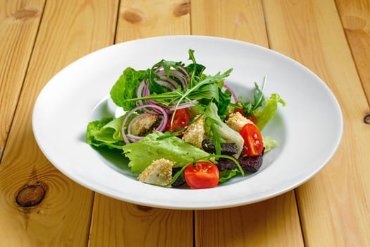 Lenten salad with onion, beetroot, tomato, feta and sesame