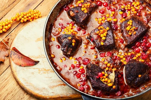 Pieces of beef stewed in sea buckthorn and cranberries