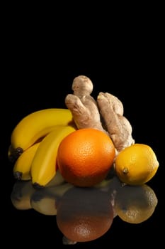 Bananas, orange, lemon and ginger - fresh ingredients
