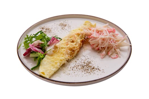 Omelette with crab meat and salad