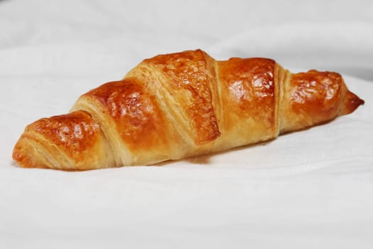 Fresh baked croissants on napkin