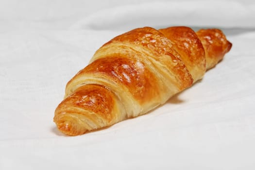 Fresh baked croissants on napkin