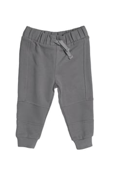 Childrens sportswear. Close-up of a gray kids baby sports sweatpants isolated on white background. Spring and autumn fashion pants for childs.