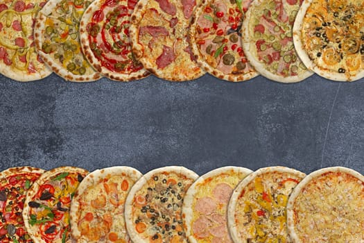 Horizontal collage of different baked pizzas on metal plate. Top view.