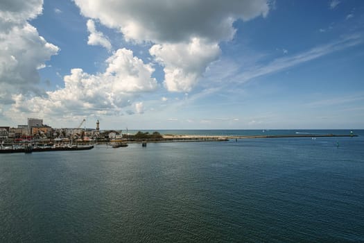 Rostock harbor exit. view over warnemünde, the beach and the lighthouse. Crossing to sweden or denmark.