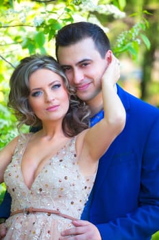 Newly wed couple outdoor on a summer day.