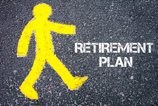 Yellow pedestrian figure on the road walking towards RETIREMENT PLAN. Conceptual image with Text message over asphalt background.