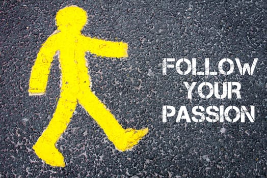 Yellow pedestrian figure on the road walking towards FOLLOW YOUR PASSION. Conceptual image with Text message over asphalt background.