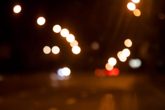 blurred night street background in Kiev out of  focus