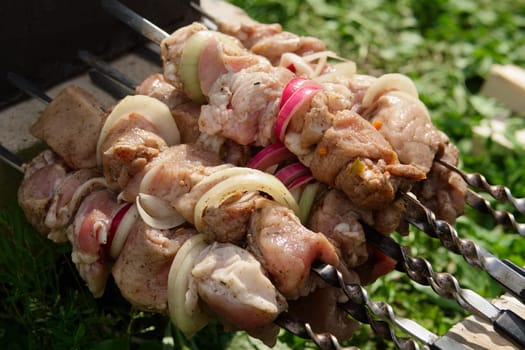 Process of cooking shashlik from pickled meat outdoor, img 2 of 17