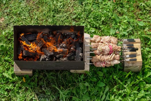 Process of cooking shashlik from pickled meat outdoor, img 3 of 17