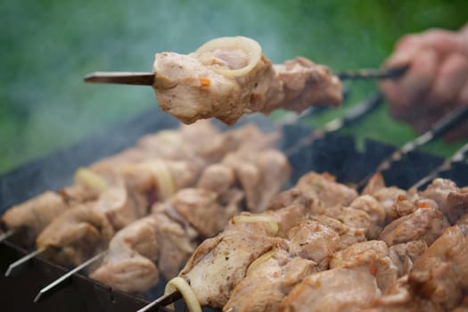 Process of cooking shashlik from pickled meat outdoor, img 8 of 17