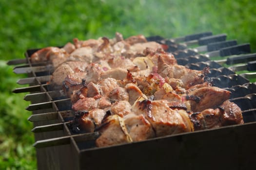 Process of cooking shashlik from pickled meat outdoor, img 7 of 17