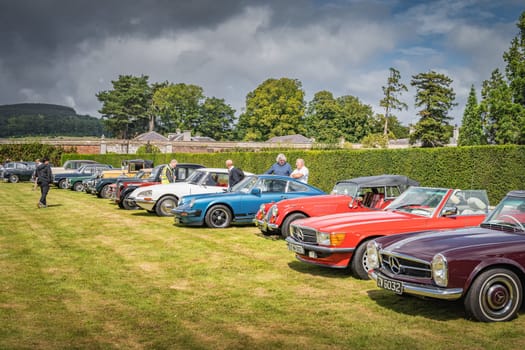 Wicklow, Ireland, August 2019 Irish Veteran and Vintage Car Club in Powerscourt, people admiring beautiful vintage cars
