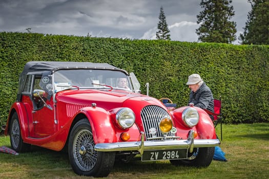 Wicklow, Ireland, August 2019 Irish Veteran and Vintage Car Club in Powerscourt, senior coulpe presenting their MORGAN 4x4 2DR convertible