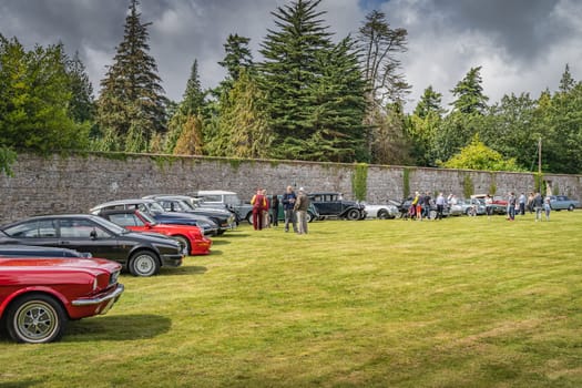 Wicklow, Ireland, August 2019 Irish Veteran and Vintage Car Club in Powerscourt, people admiring beautiful vintage cars