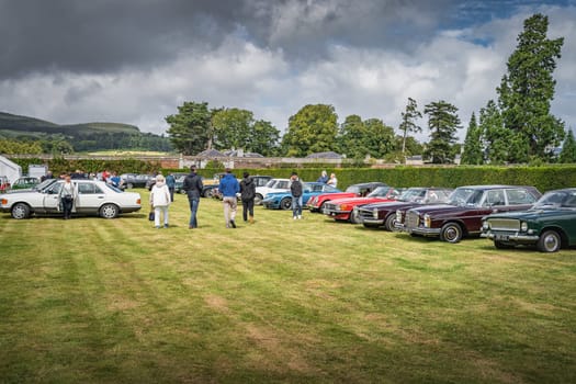 Wicklow, Ireland, August 2019 Irish Veteran and Vintage Car Club in Powerscourt, people admiring beautiful vintage cars