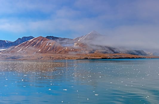 Ice Dotting a Remote Arctic Seascape in the Svalbard Islands of Norway