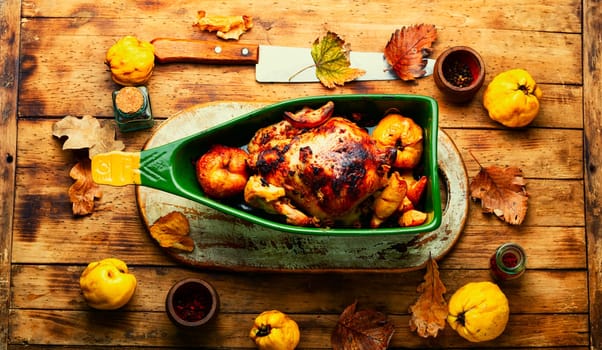 Homemade chicken baked with apples in a baking dish.