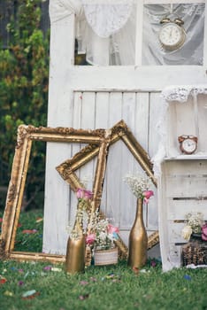 Vintage still life decoration for wedding reception. Marriage and love concept in retro style. Bridal arrangement.