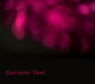Abstract pink bokeh background with black copyspace. Purple light glow template design element.