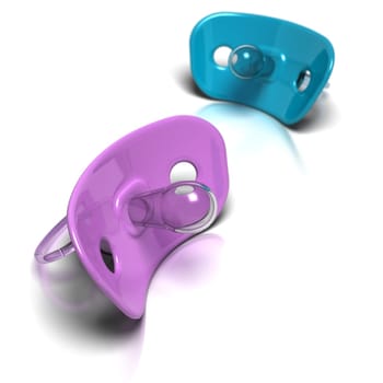 Pink and blue Pacifier over a floral background, concept for a new born baby girl or boy