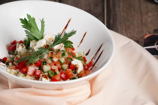 Vegetable salad with fried chicken meat. Greek salad.