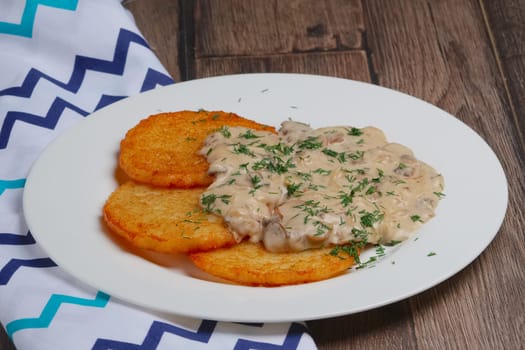 Potato pancakes with mushroom sauce