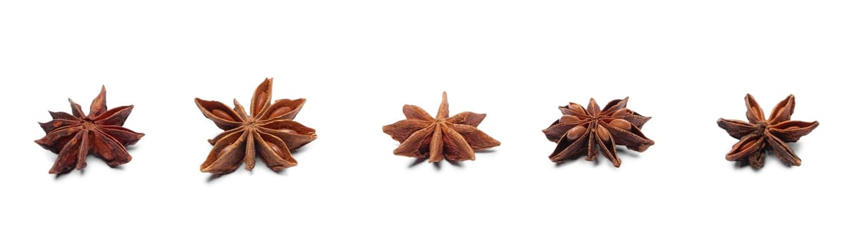 Star shape cinnamon in a row on white background