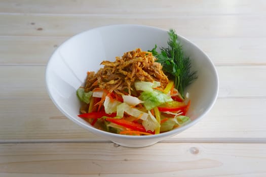 Spring salad with cabbage, bell pepper and meat