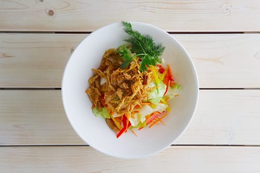 Spring salad with cabbage, bell pepper and meat