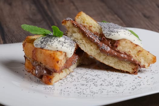 brioche with chocolate cream, sweet cheese and mint