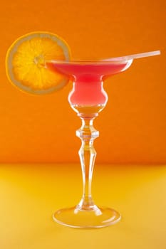 Scofflaw cocktail on orange background