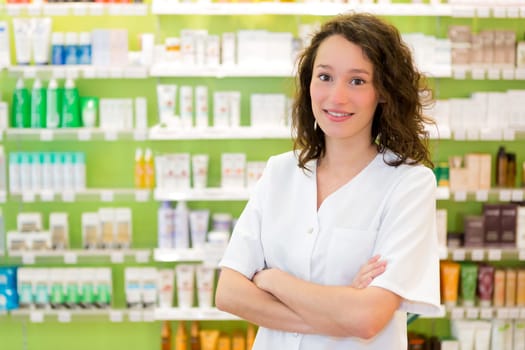 View of an attractive pharmacist at work